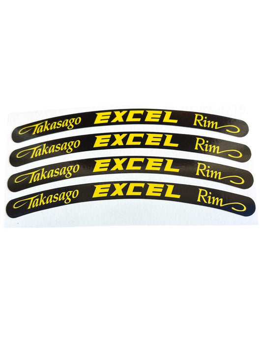 Set of five black and yellow rim decals with 'Takasago Excel Rim' text on a white background