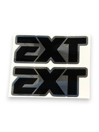 Two black 'EXT' vinyl decals with gray borders on a white backing sheet, shown against a plain white background.