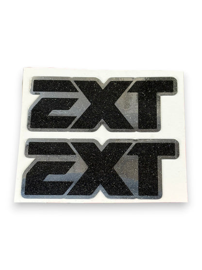 Two black textured 'EXT' decals with gray outlines on a white backing sheet, shown against a plain white background.