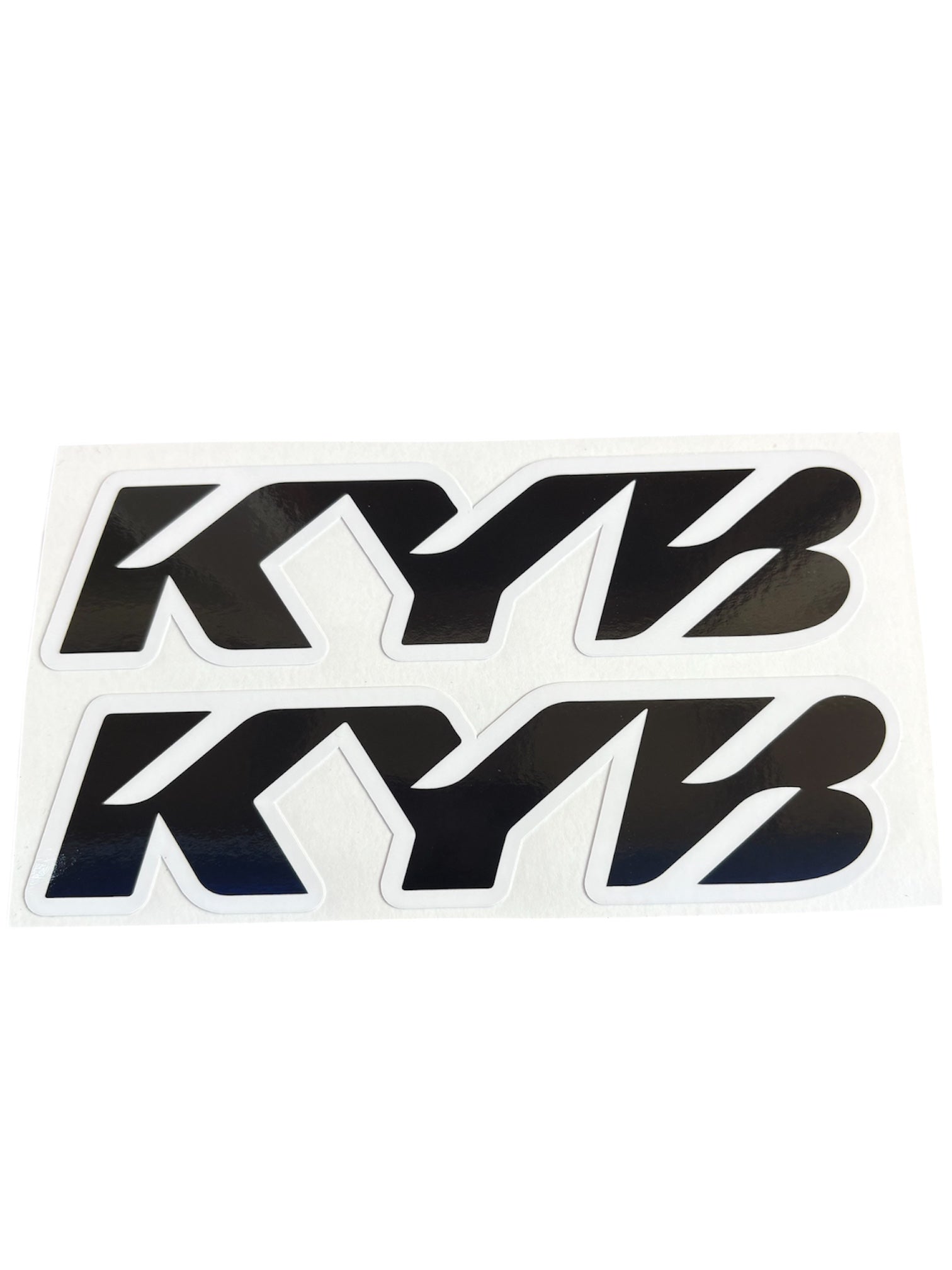 Two KYB logo stickers on a white background